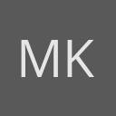 Merritt K avatar consisting of their initials in a circle with a dark grey background and light grey text.