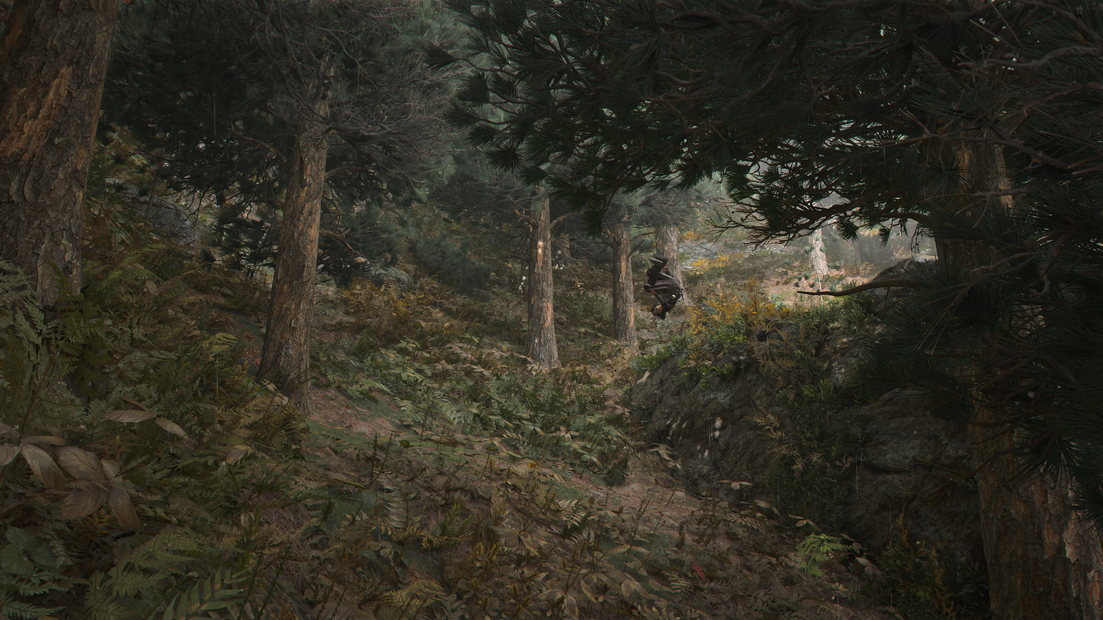 A screenshot from Assassin's Creed Shadows where Naoe is flipping through a wooded area, dense with foliage.