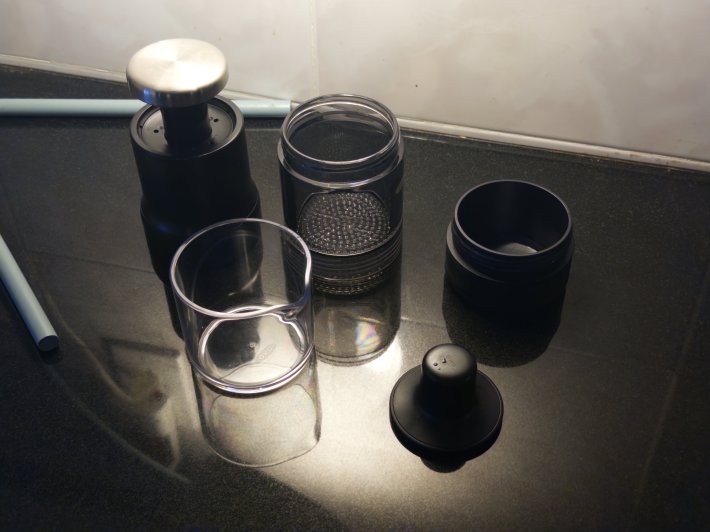 The Rapid Brewer broken down into its constituent parts on a table.