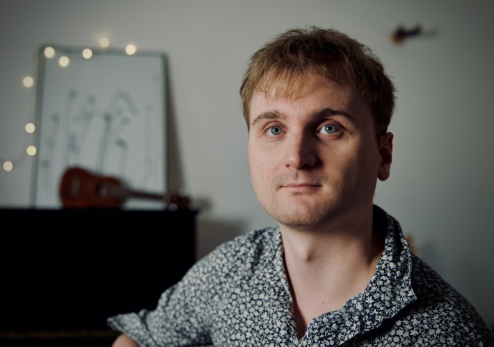 Lorien Testard sitting in his home studio.