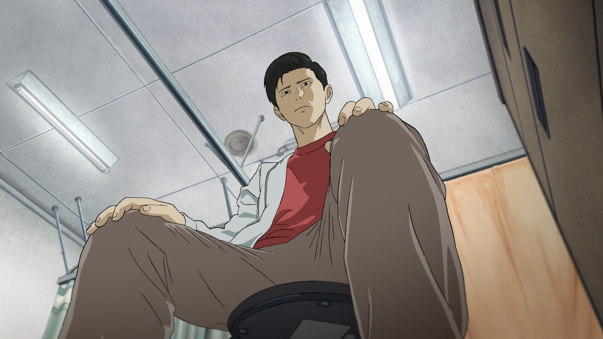 100 Meters still of Togashi struggling with his faith in his athletic ability.