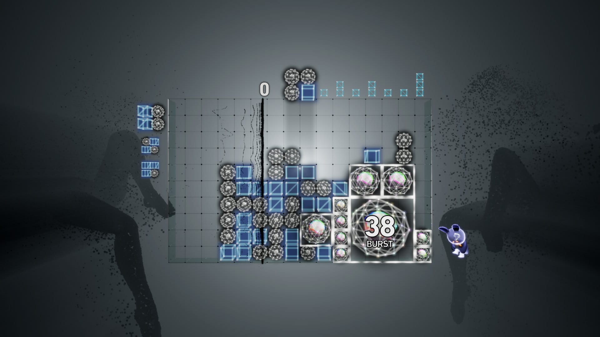 An abstract stage in Lumines Arise. The blocks are cubes and complex bucky balls. A large tile says "38 Burst", as this is in Burst mode, a new mechanic. The legs of two figures in outline can be seen flanking the sides.