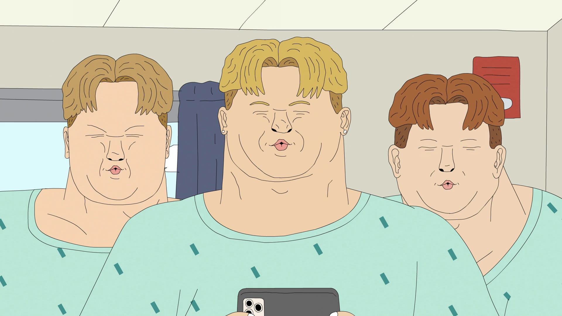 The three large boys in hospital gowns. Preston has his phone out. They are making kissy lips to the camera, eyes closed, and telling their father they love him.