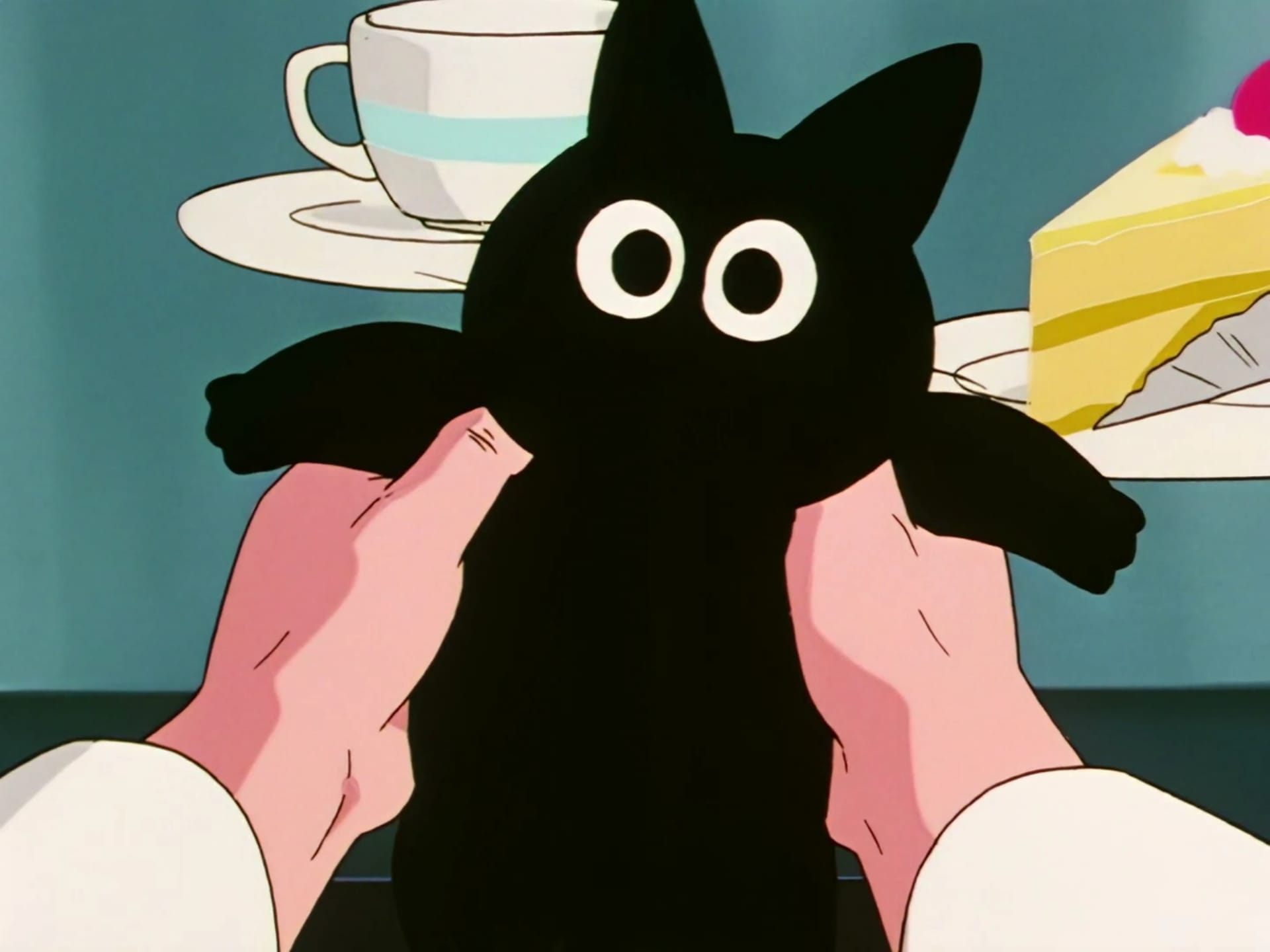 Dragon Ball Z still of Dr. Briefs holding Tama. 