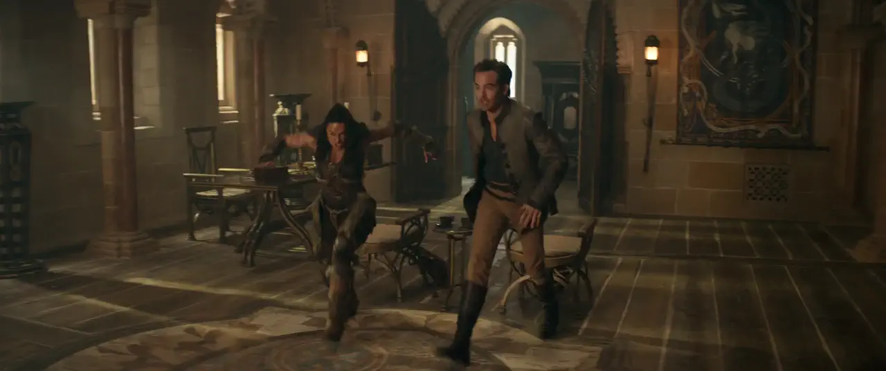 An animated webp of Dungeons & Dragons: Honor Among Thieves where they step in a carpet that turns into sand with magic. It's a mixed practical shot with very good compositing.